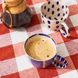 Jones & Co Chino Mug Boss Blue Spot featuring a stylish blue spotted design on a ceramic mug.