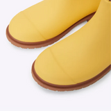 Yellow Merry People Bobbi gumboots with sunflower design, waterproof rubber boots for rainy days.
