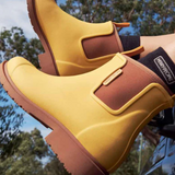 Merry People Bobbi Gumboot in sunflower yellow, waterproof rubber rain boots with a glossy finish and sturdy sole.