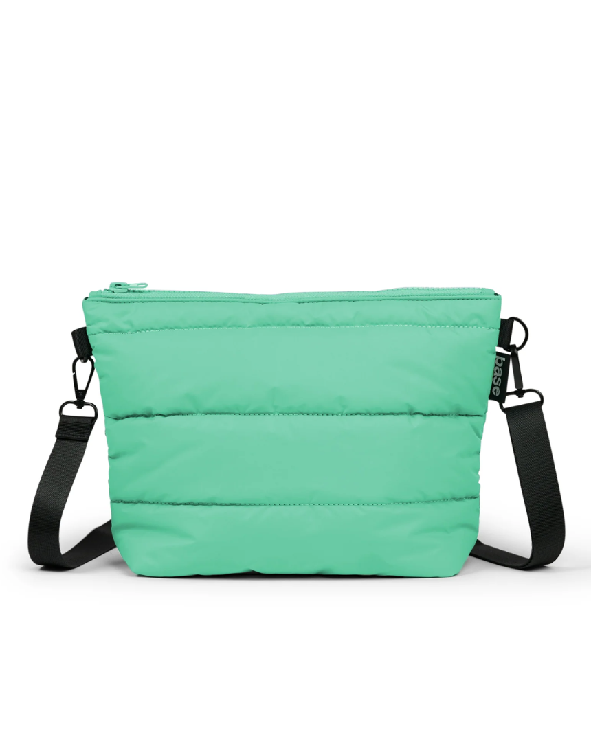 Mint green Crossbody Bag from Base Cloud Stash series, featuring a sleek design with adjustable strap and minimalist style.