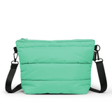 Mint green Crossbody Bag from Base Cloud Stash series, featuring a sleek design with adjustable strap and minimalist style.