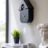Fisura Casita black cuckoo clock with detailed house design, wooden finish, and traditional clock face.