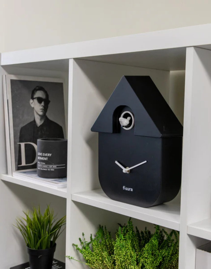 Fisura Casita Black cuckoo clock with a charming black wooden house design and traditional clock face.