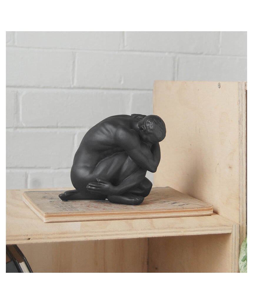 White Moose Body Sculpture Aydian in black, detailed black sculpture of a human figure with artistic features.