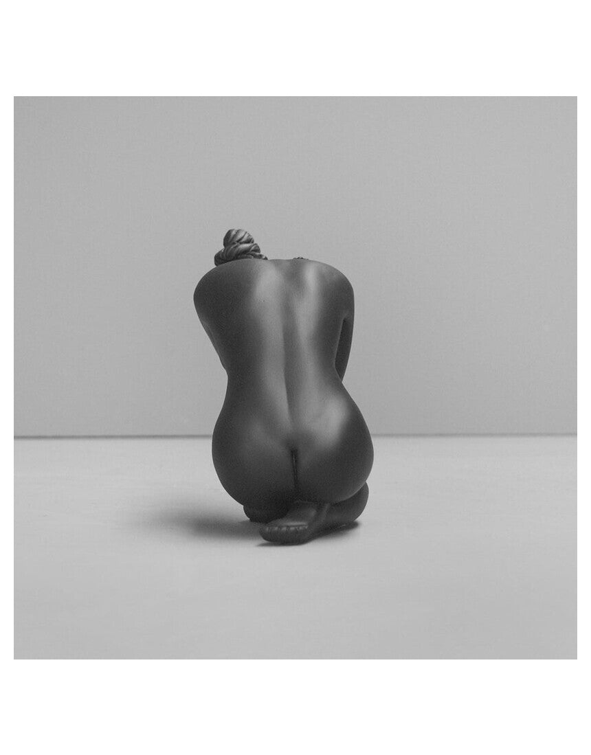 Black White Moose Body Sculpture Georgie, a detailed artistic sculpture of a moose in a sleek black finish.
