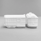 White Moose Tram bookends in white with modern tram design, holding books on a shelf.