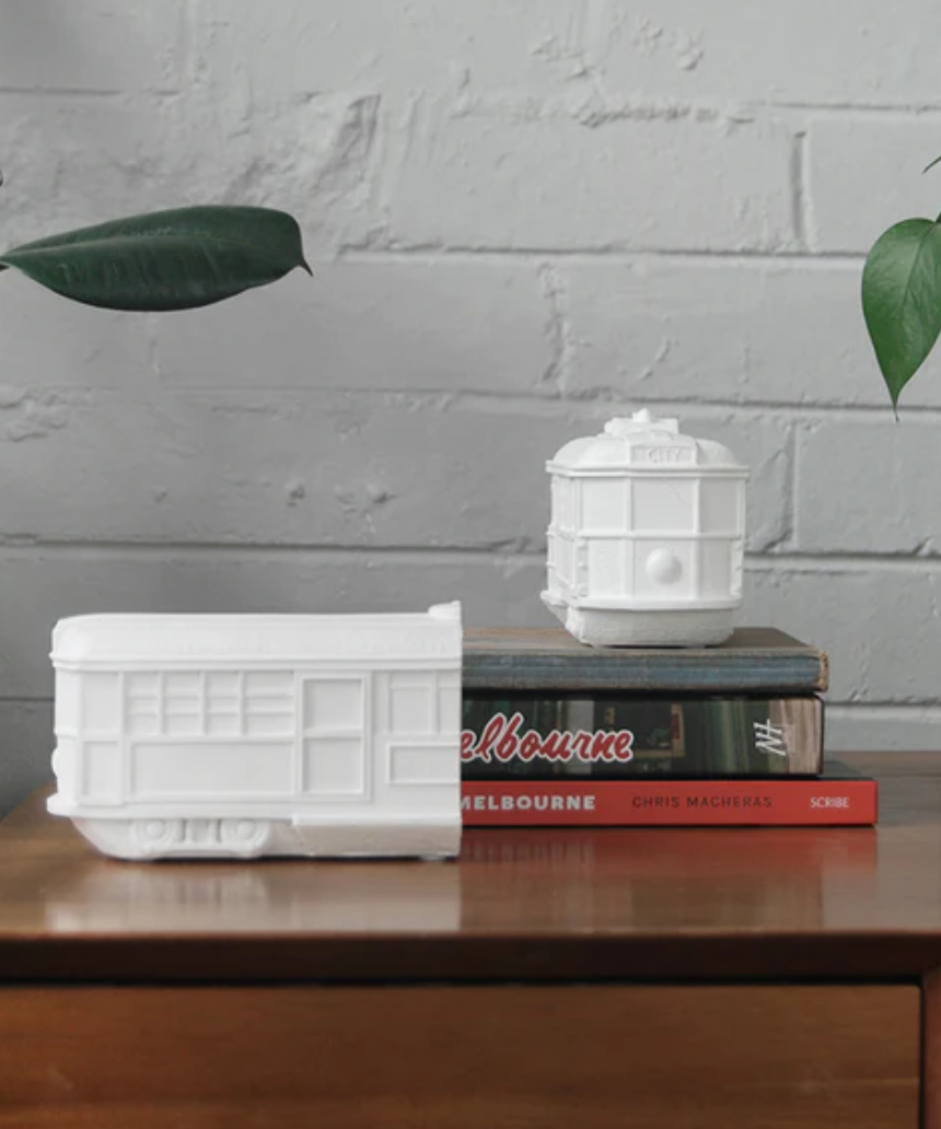 White Moose Tram Bookends in white, featuring a modern design to hold and display books on a shelf.