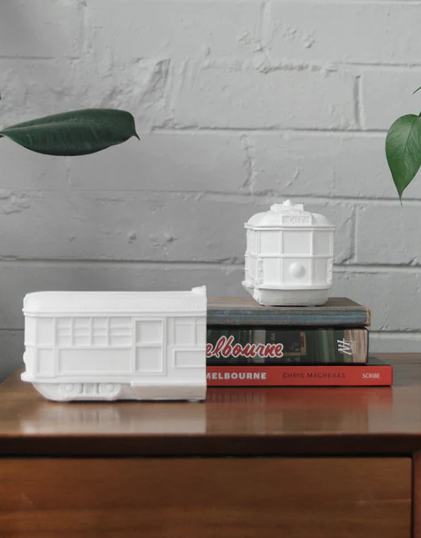 White Moose Tram Bookends in white, featuring a modern design to hold and display books on a shelf.