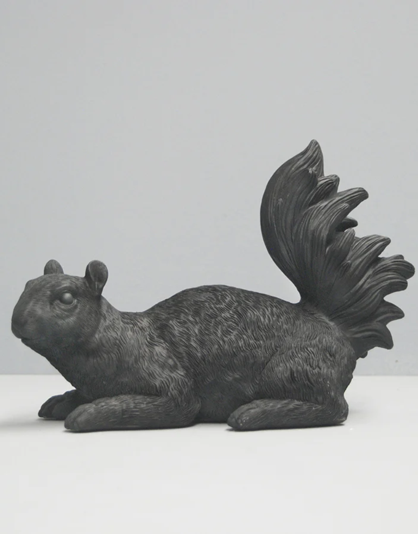 White Moose squirrel twin set of homewares in black, featuring decorative squirrel motifs on soft fabric.