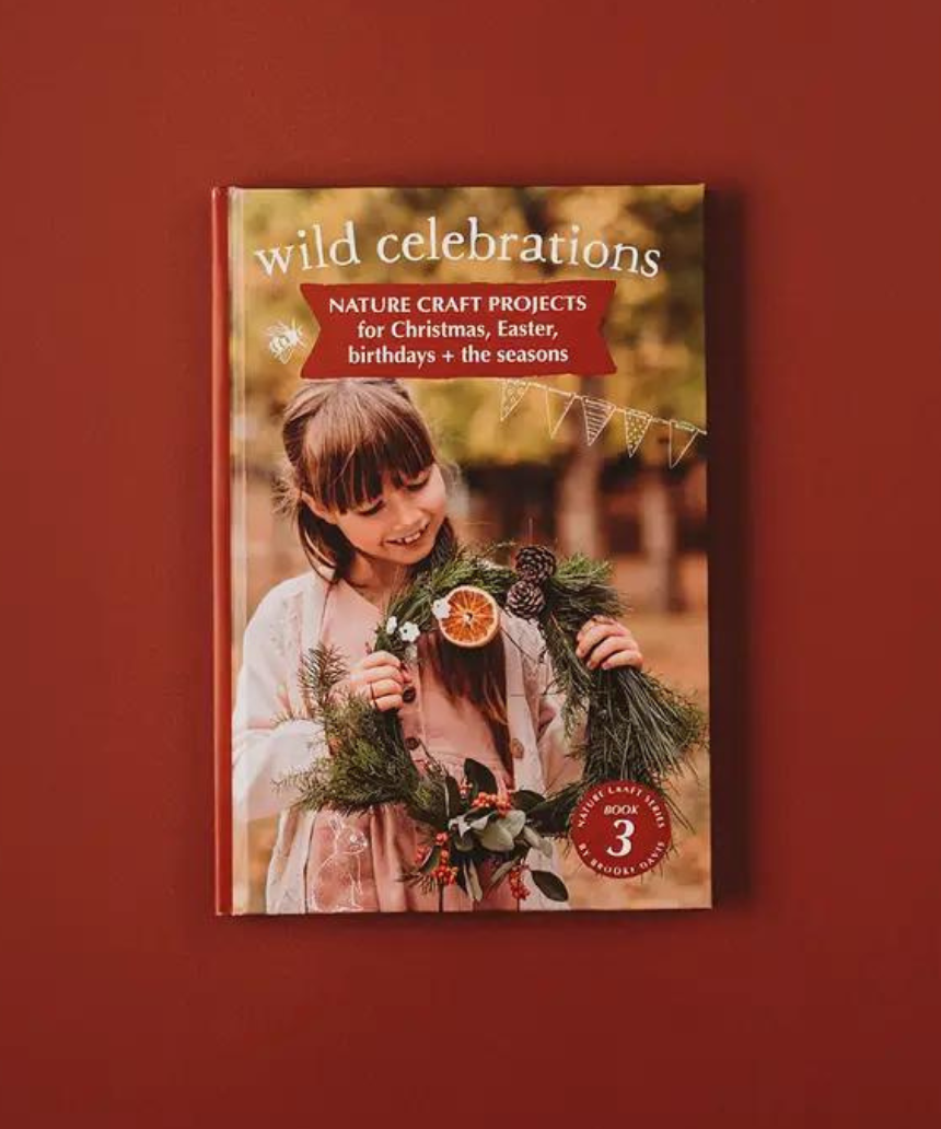 Open pages of Your Wild Books Wild Celebrations Book showing colorful illustrations and vibrant celebration scenes.