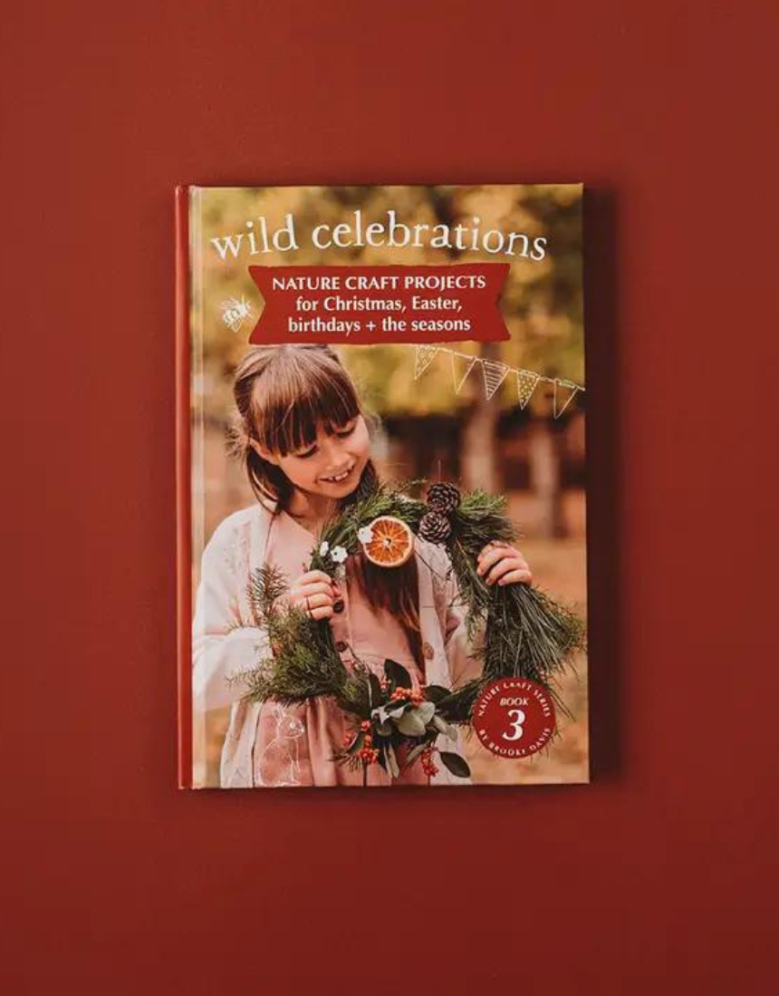 Open pages of Your Wild Books Wild Celebrations Book showing colorful illustrations and vibrant celebration scenes.