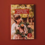 Open pages of Your Wild Books Wild Celebrations Book showing colorful illustrations and vibrant celebration scenes.