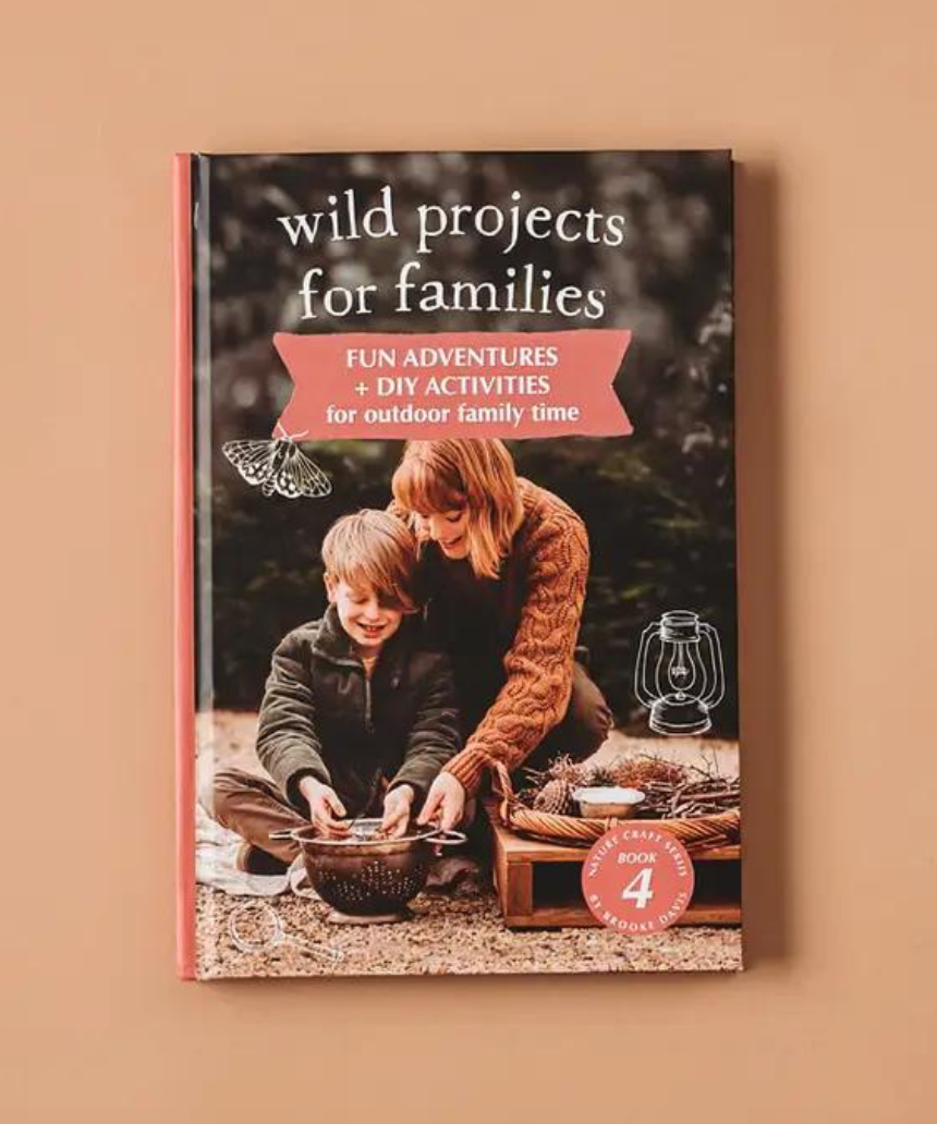 Open page of Your Wild Books Wild Projects For Families Book showing colorful activity spreads and project ideas for family fun.