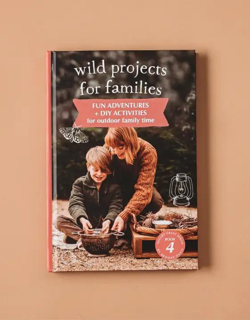 Open page of Your Wild Books Wild Projects For Families Book showing colorful activity spreads and project ideas for family fun.