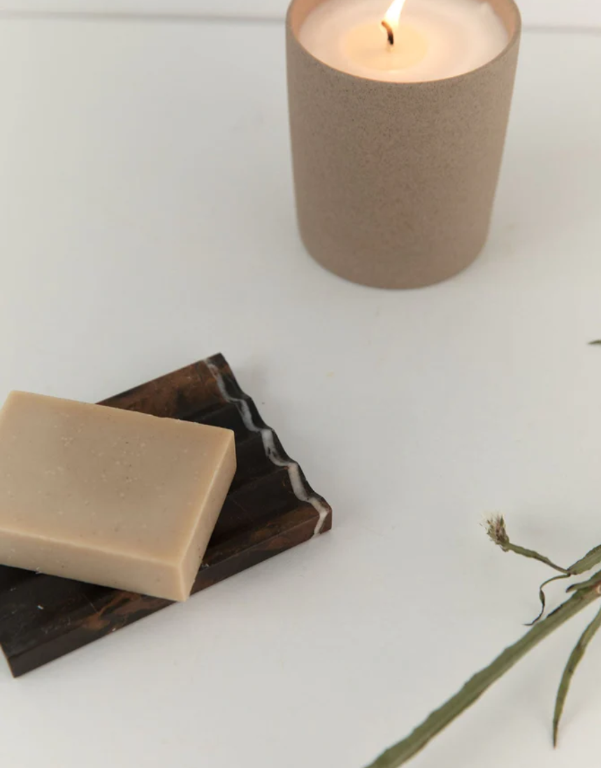 Black marble Addition Studio stone holder with sleek design and smooth finish, perfect for home decor and organization.