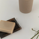 Black marble Addition Studio stone holder with sleek design and smooth finish, perfect for home decor and organization.