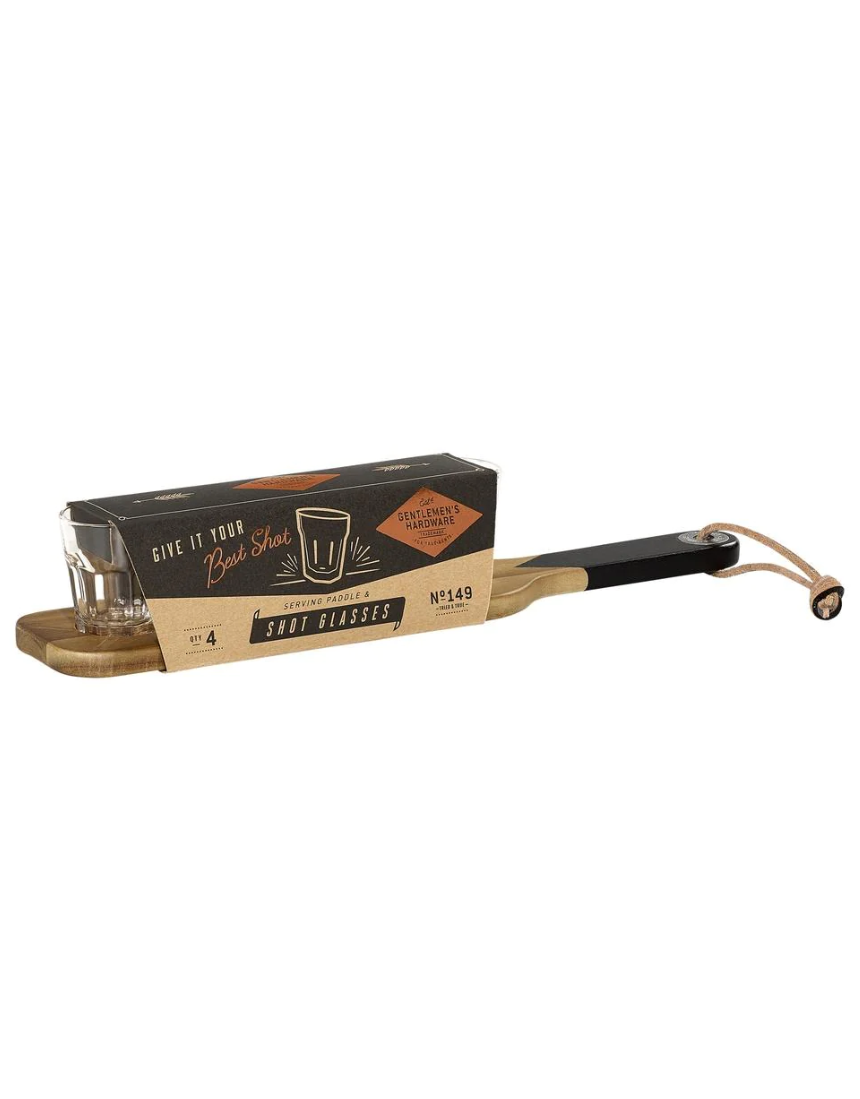 Gentlemen's Hardware shot glasses with a wooden serving paddle, perfect for outdoor gatherings and stylish presentation.