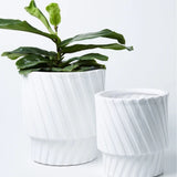 Jones & Co Moma Planter Set with white vase and matching pots, modern ceramic decor for indoor plants.