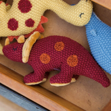 Lily & George Tracey Triceratops plush toy rattle with soft fabric and colorful details, designed for young children.
