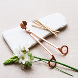 Black Mojo Candle Co. wick trimmer for candles, with a sleek design and easy-to-use handle, ideal for maintaining candle wicks.