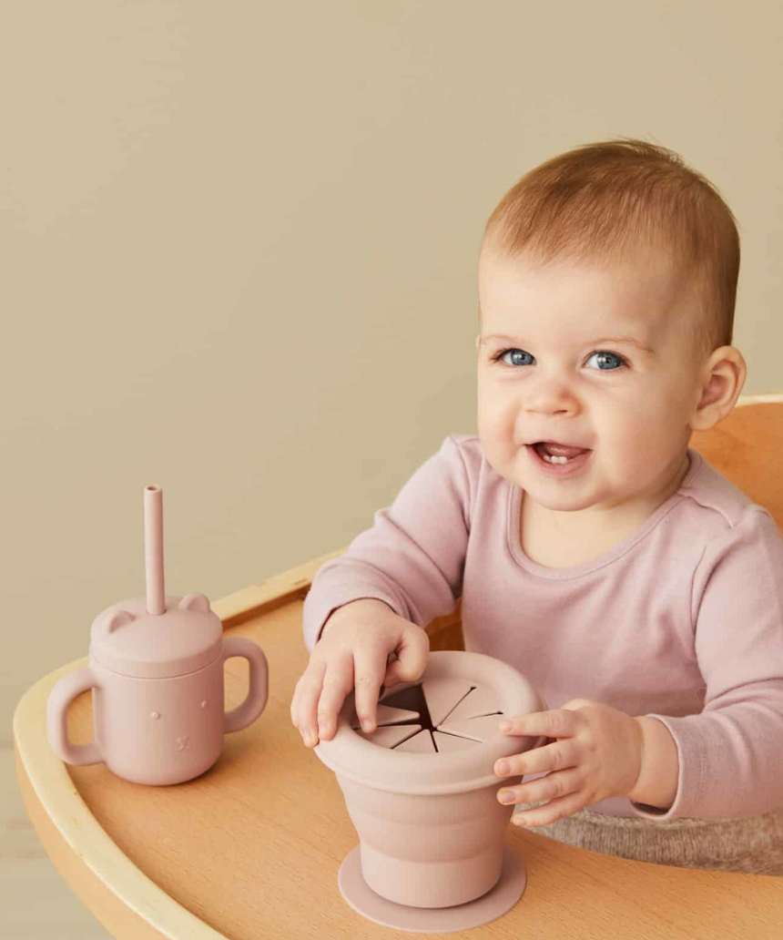 Nordic Kids Henny silicone sippy cup with straw for babies in musk color, part of Nordic Kids baby gift sets.