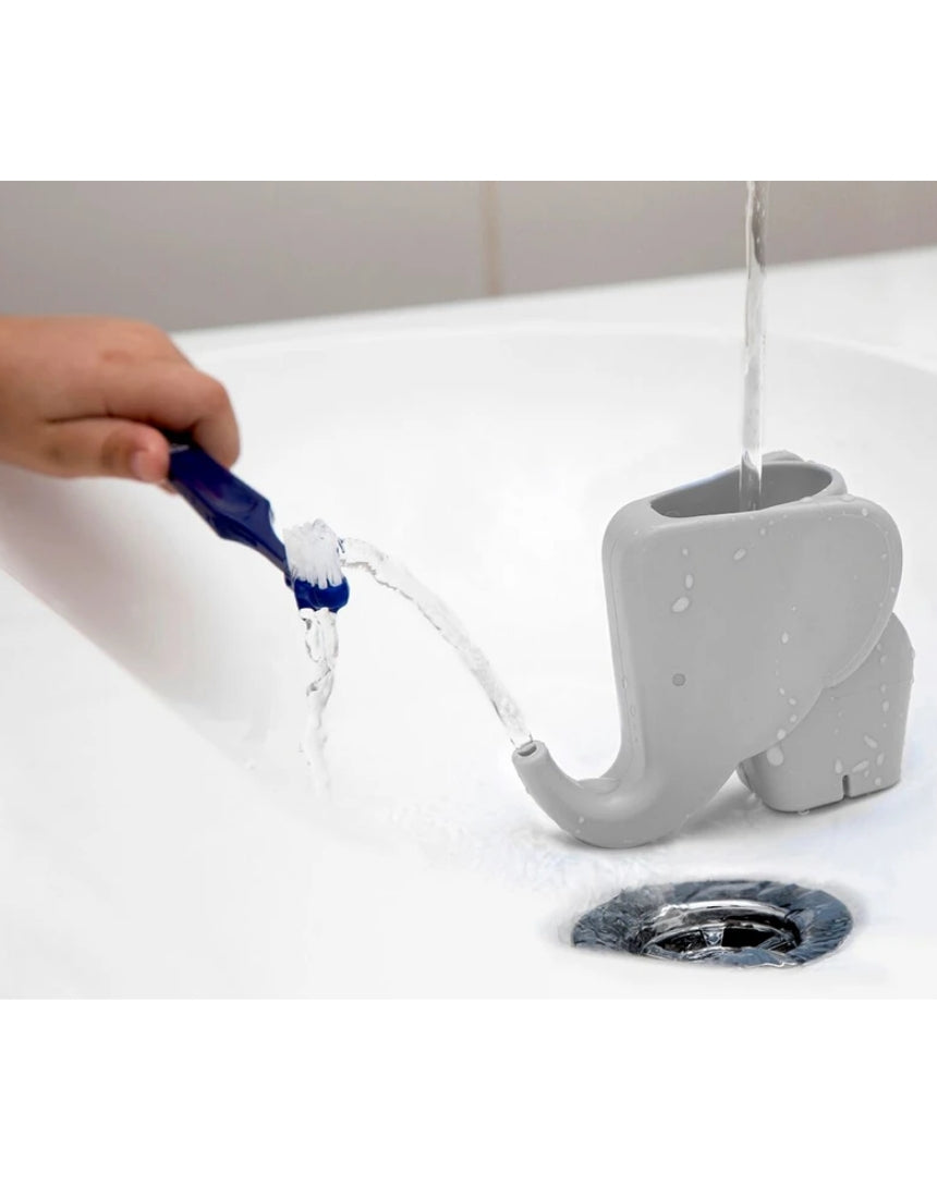 Peleg Design Jumbo Jr Faucet Fountain in grey, a playful homewares water feature with a faucet design.