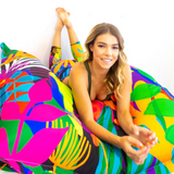Riley Burnett Secret Garden bean bag chair with colorful fabric and plush cushion for comfortable seating.