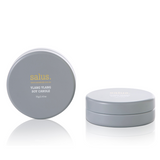 Salus Ylang Ylang Travel Soy Candle with floral scent in a small glass container, ideal for portable relaxation and aromatic ambiance.