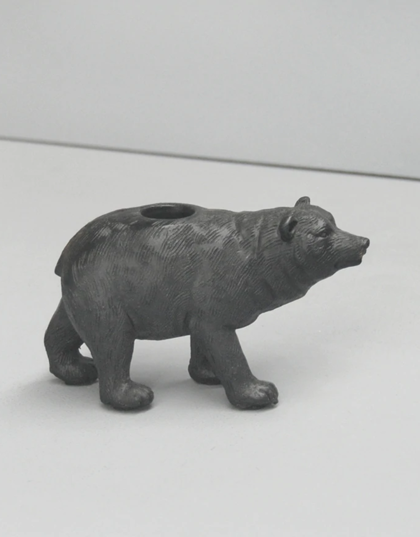Black White Moose bear candle holder made of ceramic, designed to hold candles and add a decorative touch to spaces.