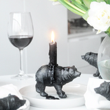 White Moose black bear candle holder, decorative ceramic candle holder featuring a bear design in black finish.