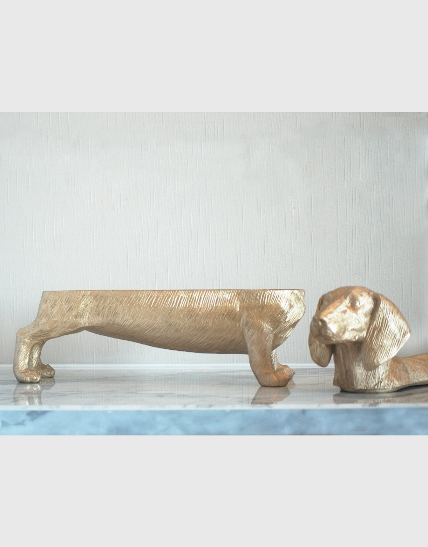 White Moose Dachshund Secret Bowl in gold, a stylish homeware piece featuring a dachshund design on a white background.
