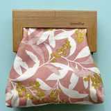 Yellow Bird Signature Medium Clutch with Wattle Tassie Oak frame, showcasing a sleek design and vibrant yellow color.