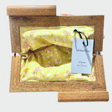 Yellow Bird Signature Medium Clutch with Wattle Tassie Oak frame, showcasing a stylish yellow bird design and elegant craftsmanship.